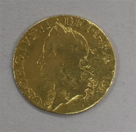 A gold copy of a George II half guinea, 1750, 4.1g